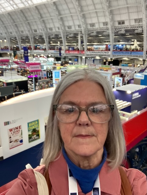Image of the writer's face with stalls in the background